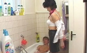Perverted Stepmom Provides More Of Helping Young Man While Taking Bath